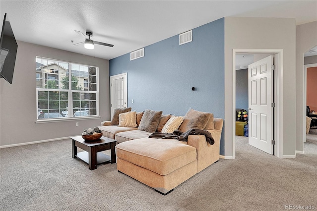 17442 Nature Walk Trl Unit 105, Parker, CO 80134 - carpeted living area with a ceiling fan and baseboards