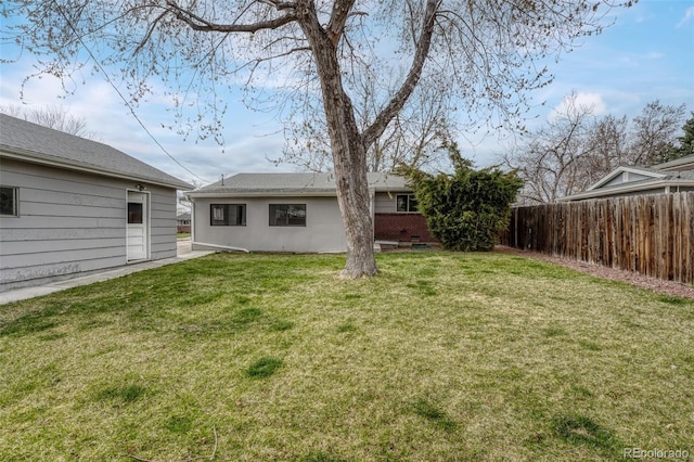 view of yard with fence