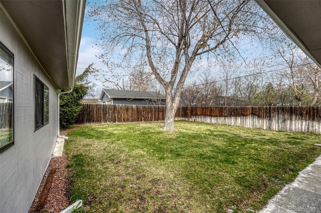 view of yard featuring a fenced backyard