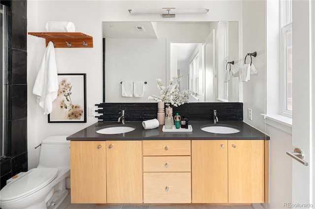 340 S Lafayette St Unit 201, Denver, CO 80209 - bathroom with toilet and double vanity