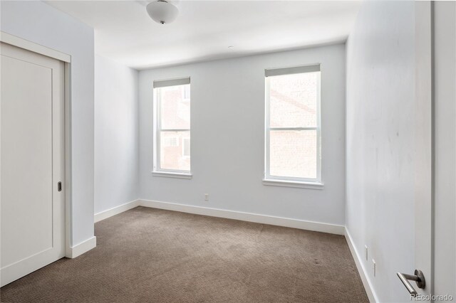340 S Lafayette St Unit 201, Denver, CO 80209 - carpeted spare room with baseboards