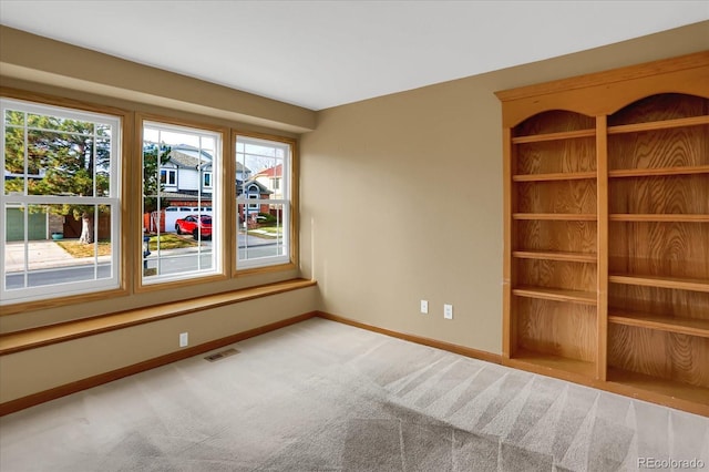 empty room with carpet flooring