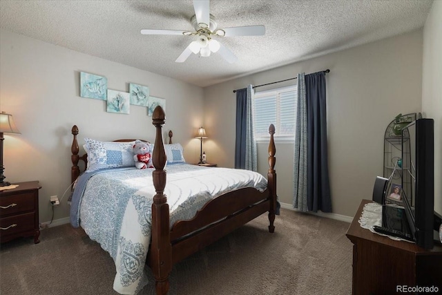 bedroom with dark colored carpet, ceiling fan, and a textured ceiling