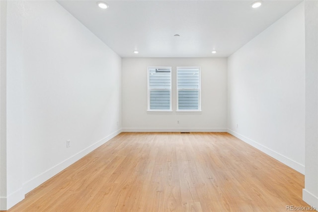 9322 Quaker St, Arvada, CO 80007 - unfurnished room featuring baseboards, light wood-style flooring, and recessed lighting