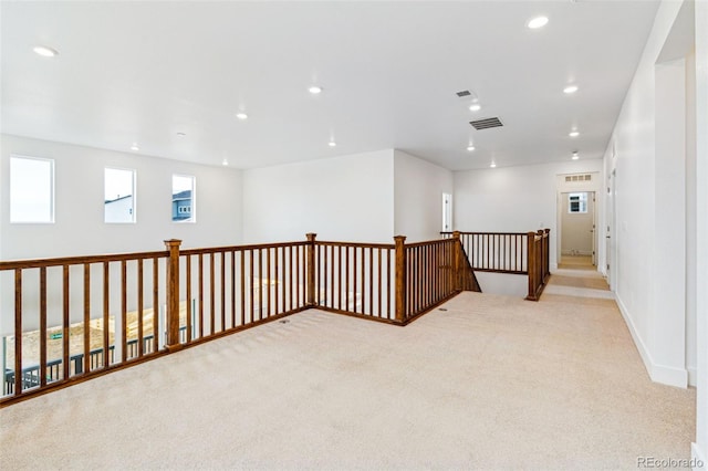9322 Quaker St, Arvada, CO 80007 - interior space with visible vents, light carpet, baseboards, and recessed lighting