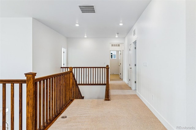 9322 Quaker St, Arvada, CO 80007 - hallway featuring recessed lighting, an upstairs landing, light colored carpet, and visible vents