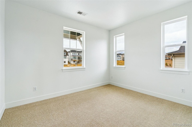 9322 Quaker St, Arvada, CO 80007 - carpeted spare room featuring baseboards and visible vents