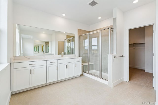9322 Quaker St, Arvada, CO 80007 - full bath with visible vents, a stall shower, recessed lighting, and vanity