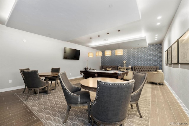 dining area with pool table and hardwood / wood-style flooring