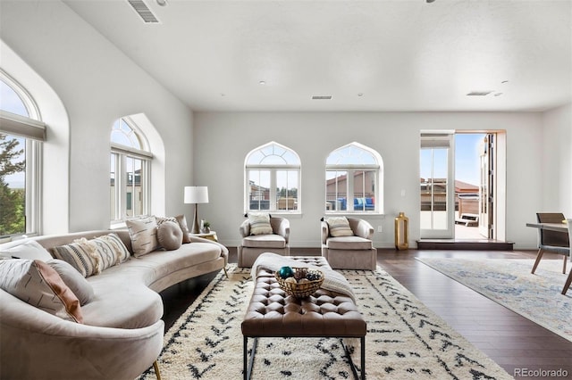 living room with dark hardwood / wood-style flooring