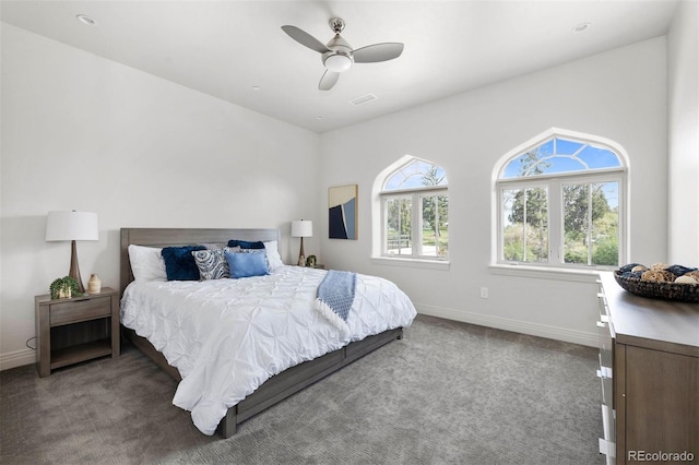 carpeted bedroom with ceiling fan