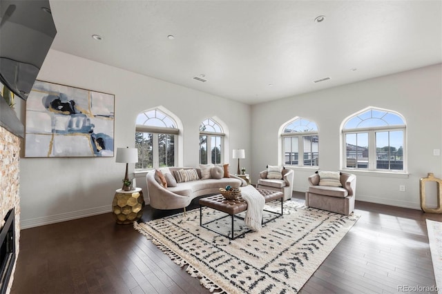 living room featuring dark hardwood / wood-style flooring