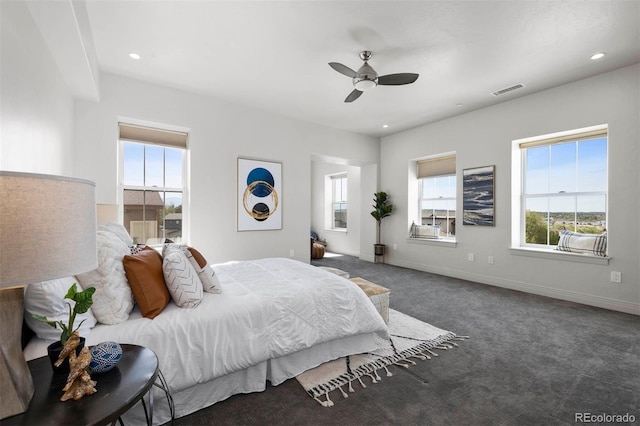 carpeted bedroom featuring ceiling fan