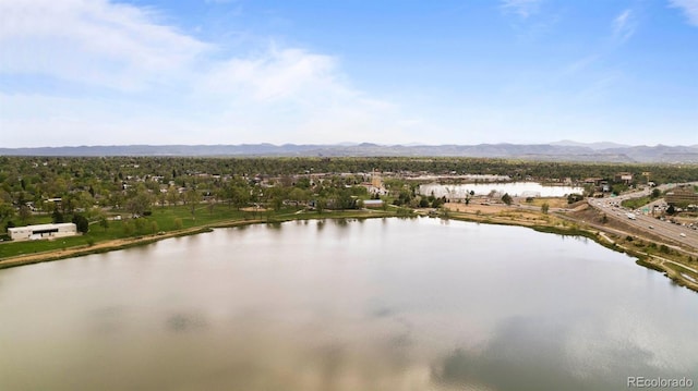 bird's eye view with a water and mountain view