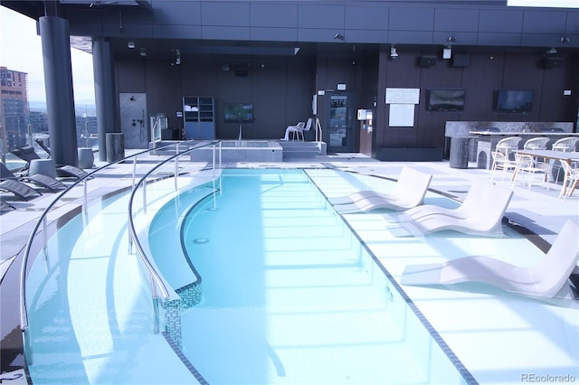 view of pool with a patio area