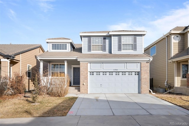 front of property with a garage