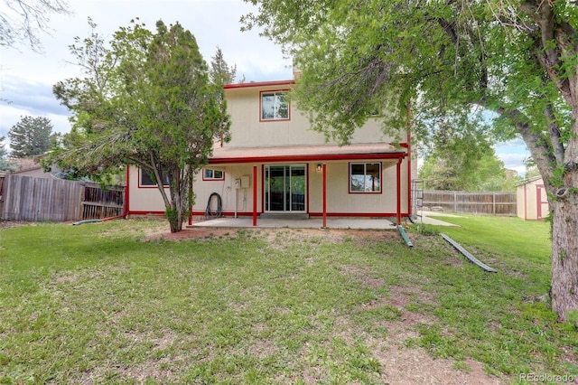 7552 Garland St, Arvada, CO 80005 - back of house with a patio area, a storage unit, and an outdoor structure