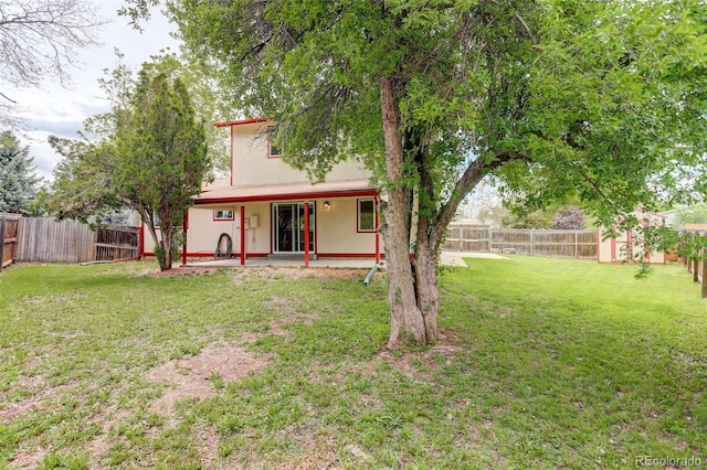 7552 Garland St, Arvada, CO 80005 - rear view of house featuring a patio