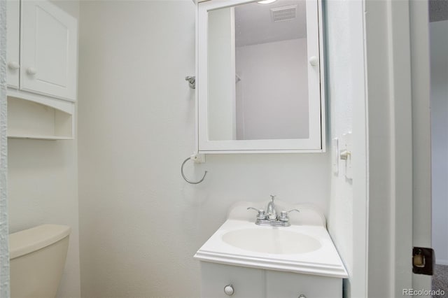7552 Garland St, Arvada, CO 80005 - bathroom with vanity and toilet