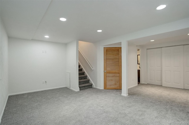 7552 Garland St, Arvada, CO 80005 - finished below grade area with recessed lighting, stairway, carpet floors, and baseboards