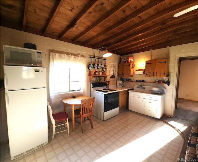 kitchen featuring vaulted ceiling with beams, white appliances, wooden ceiling, and sink