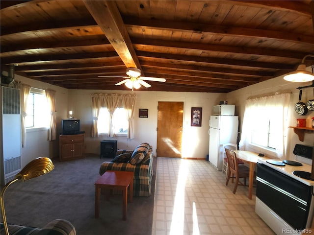 living room with ceiling fan, beam ceiling, and wooden ceiling