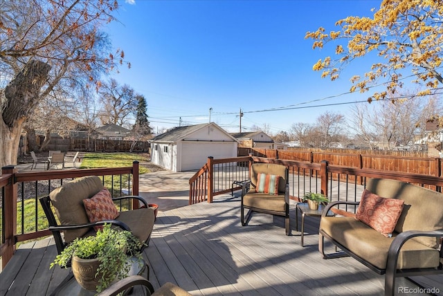 deck with an outdoor structure and a fenced backyard