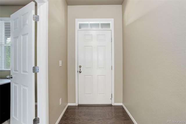 467 S 36th Ave, Brighton, CO 80601 - doorway to outside with dark wood finished floors and baseboards