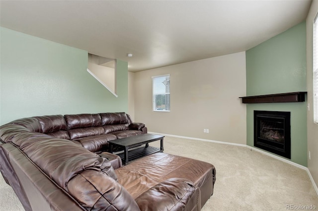 467 S 36th Ave, Brighton, CO 80601 - living area with carpet, a glass covered fireplace, and baseboards
