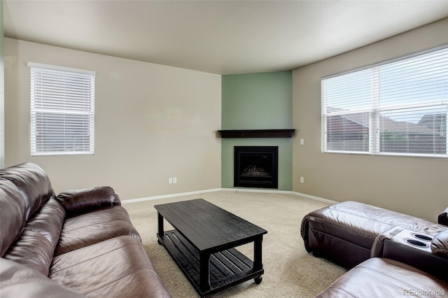 467 S 36th Ave, Brighton, CO 80601 - carpeted living area featuring baseboards and a fireplace
