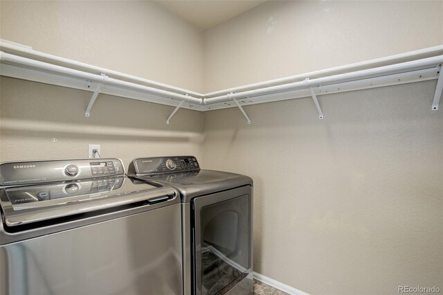467 S 36th Ave, Brighton, CO 80601 - laundry area with separate washer and dryer and baseboards