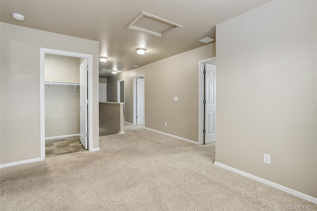 467 S 36th Ave, Brighton, CO 80601 - unfurnished bedroom with attic access, carpet, baseboards, a spacious closet, and a closet