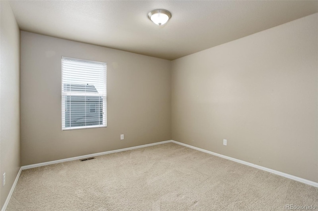 467 S 36th Ave, Brighton, CO 80601 - carpeted empty room with baseboards