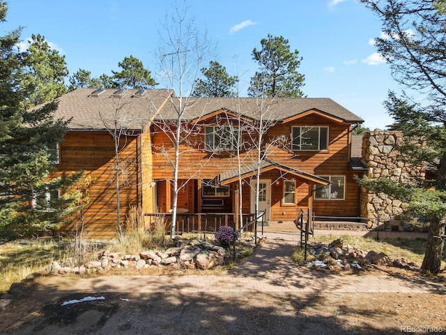 28730 Mountain View Rd, Conifer, CO 80433 - rustic home featuring covered porch