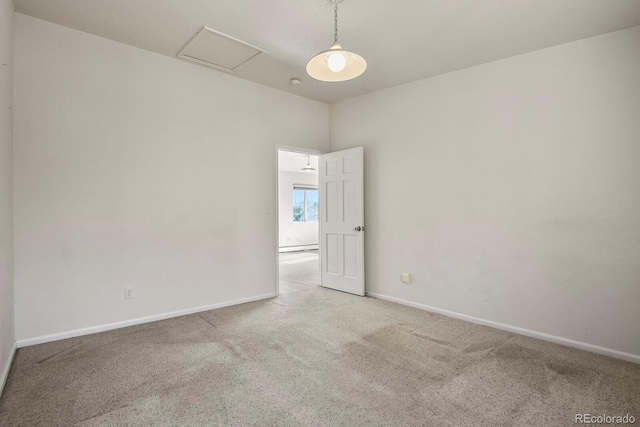 28730 Mountain View Rd, Conifer, CO 80433 - unfurnished room featuring carpet, baseboards, and attic access