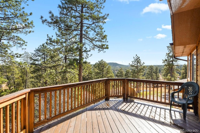 wooden terrace with a mountain view