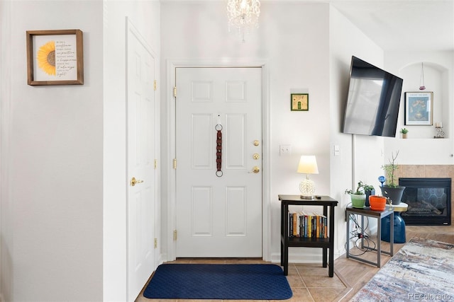 entrance foyer featuring a tile fireplace