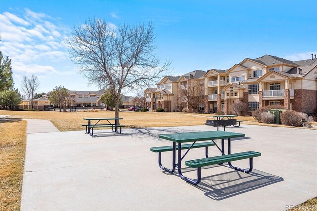 5735 N Genoa Way Unit 11-205, Aurora, CO 80019 - view of property's community featuring a residential view and a yard