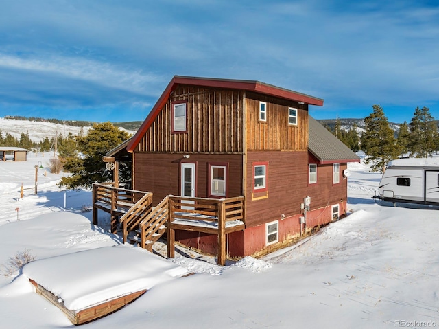 view of snow covered property