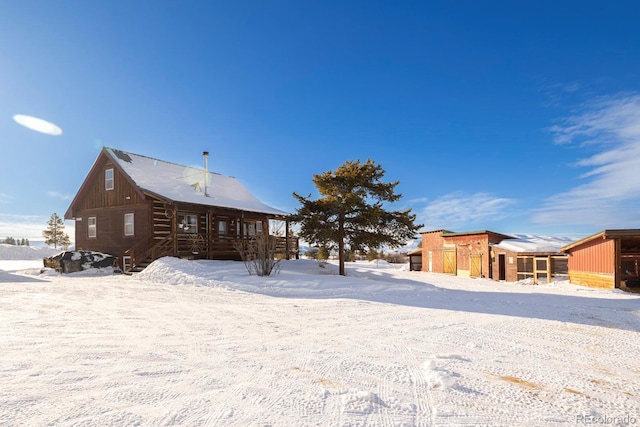 view of snow covered property