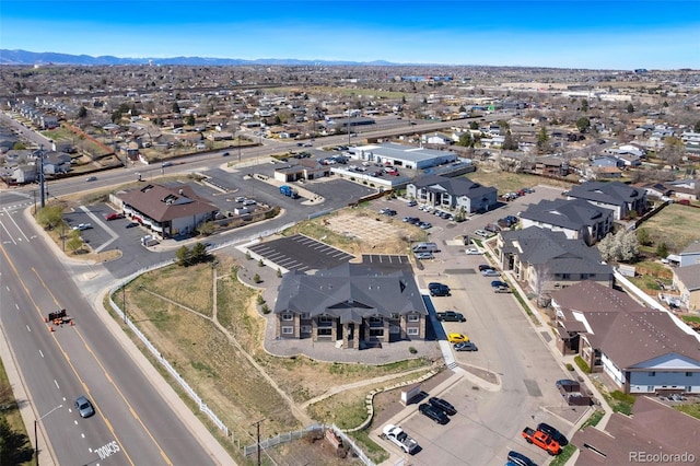 aerial view with a mountain view and a residential view