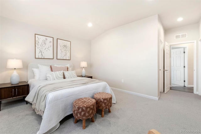 carpeted bedroom with vaulted ceiling, recessed lighting, visible vents, and baseboards