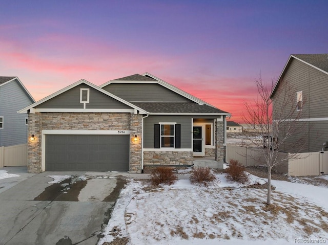 view of front of property with a garage