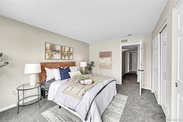 bedroom featuring carpet flooring, visible vents, and baseboards