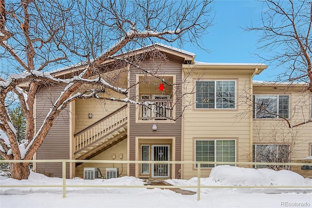 view of front of property with stairway