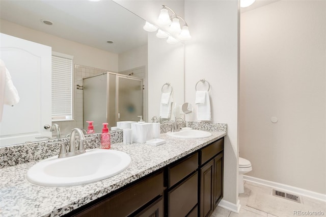 12513 Grape St, Thornton, CO 80241 - bathroom featuring double vanity, a shower stall, and tile patterned flooring