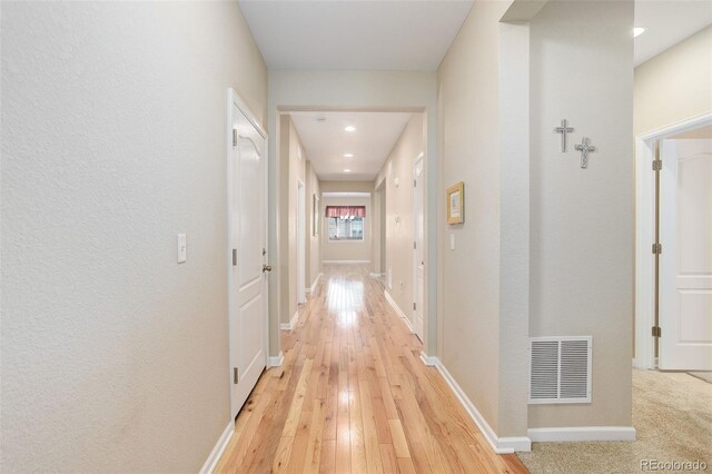12513 Grape St, Thornton, CO 80241 - corridor with light wood finished floors and recessed lighting