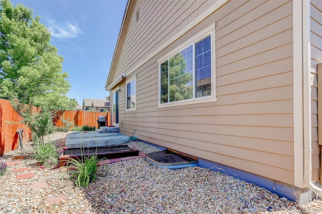 12513 Grape St, Thornton, CO 80241 - view of property exterior with a wooden deck