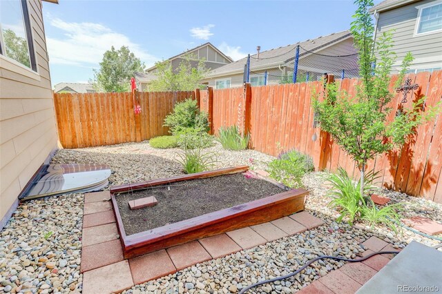 12513 Grape St, Thornton, CO 80241 - fenced backyard featuring a vegetable garden