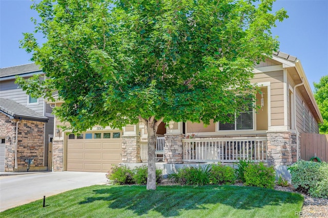 12513 Grape St, Thornton, CO 80241 - view of property hidden behind natural elements featuring stone siding, driveway, an attached garage, a porch, and a front lawn